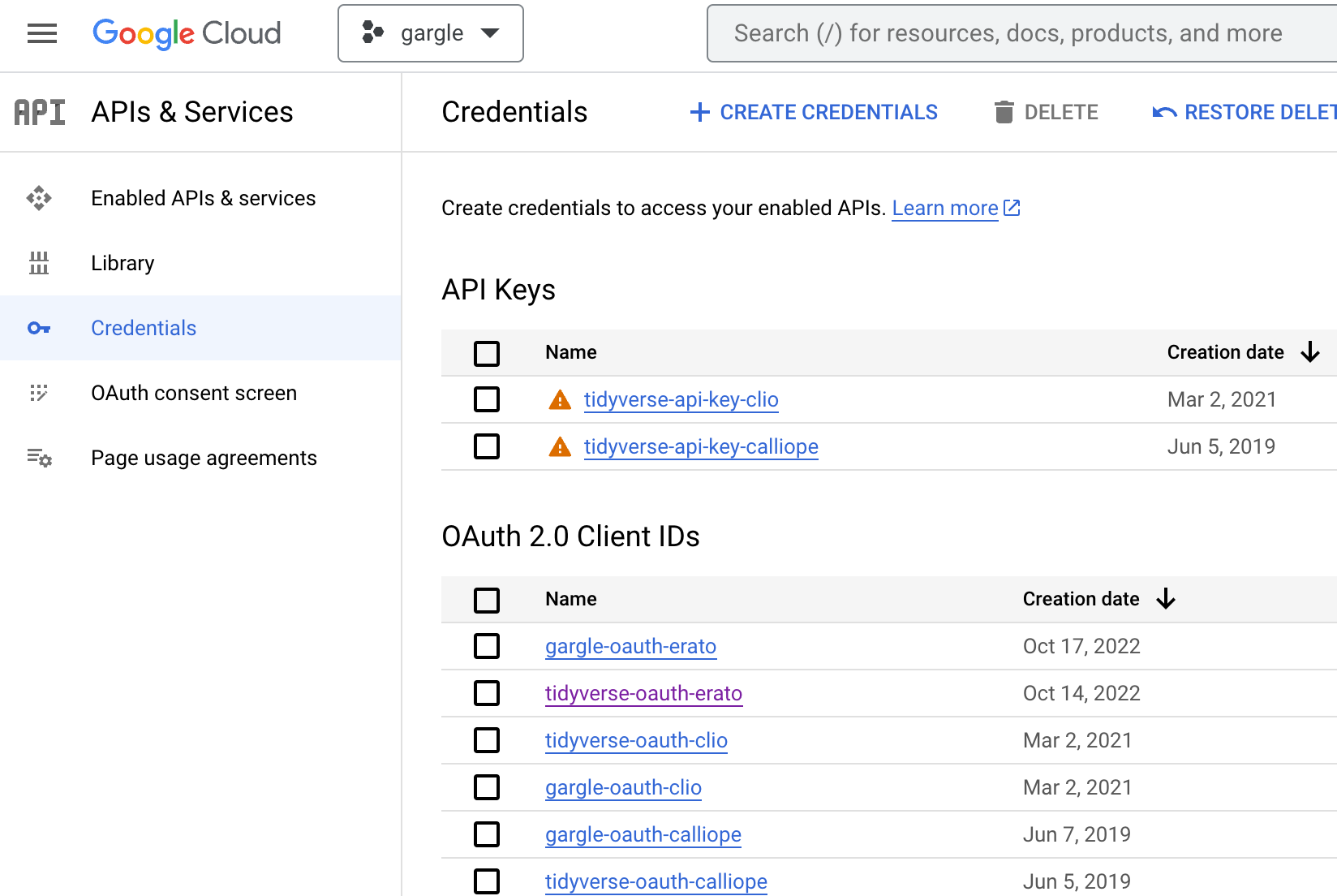 Screenshot of the 'Credentials' page showing existing credentials, e.g. a couple of API keys and several OAuth 2.0 Client IDs.
